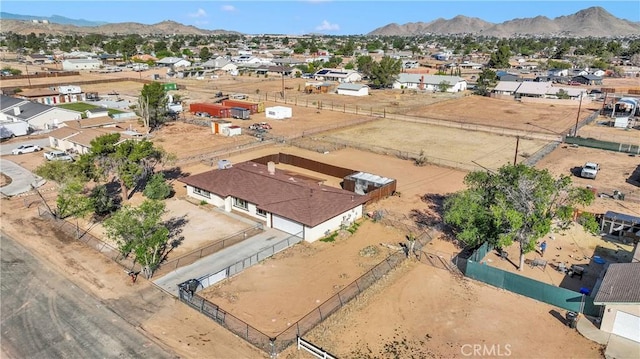 bird's eye view featuring a mountain view and a residential view