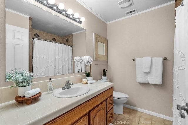 bathroom featuring vanity, toilet, tile patterned floors, visible vents, and ornamental molding