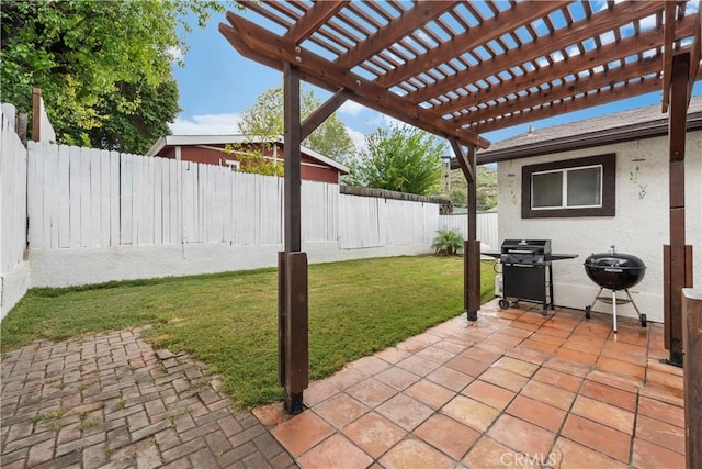 view of patio / terrace featuring grilling area, a pergola, and a fenced backyard