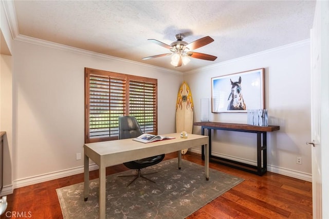 office space featuring a textured ceiling, ornamental molding, a ceiling fan, and wood finished floors