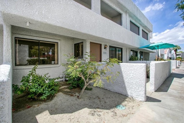 exterior space with stucco siding
