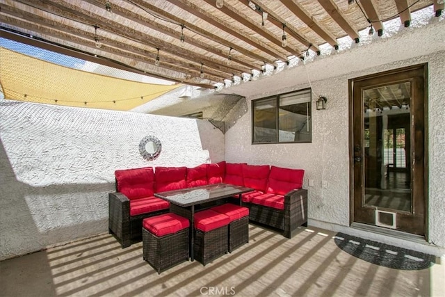 view of patio / terrace featuring a pergola and outdoor lounge area
