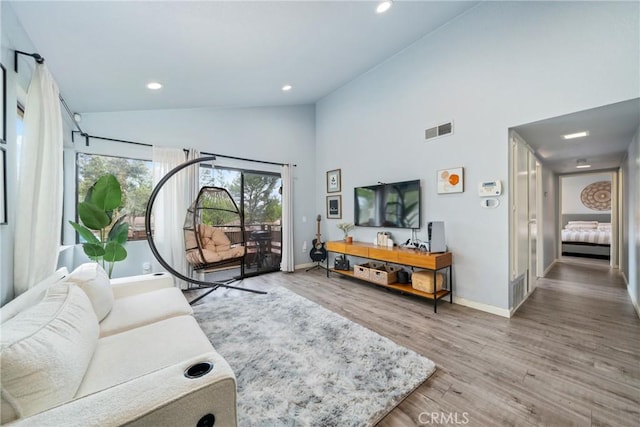 22844 Hilton Head Dr Unit 170, Diamond Bar, CA 91765 - living room featuring high vaulted ceiling, recessed lighting, baseboards, wood finished floors, and visible vents
