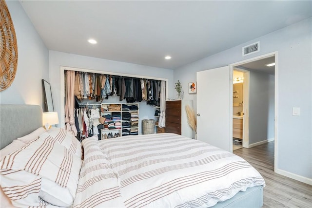 22844 Hilton Head Dr Unit 170, Diamond Bar, CA 91765 - bedroom featuring recessed lighting, baseboards, wood finished floors, visible vents, and a closet