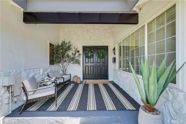 1467 N Kathleen Ln, Orange, CA 92867 - doorway to property with a porch, stucco siding, and stone siding