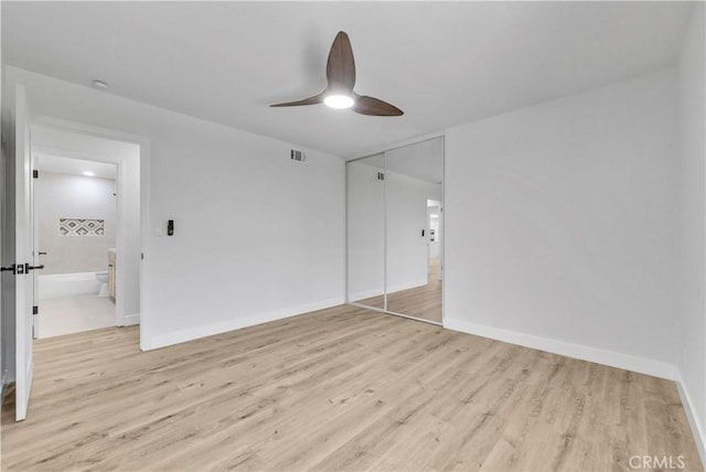 1467 N Kathleen Ln, Orange, CA 92867 - unfurnished bedroom with a closet, baseboards, and light wood-type flooring