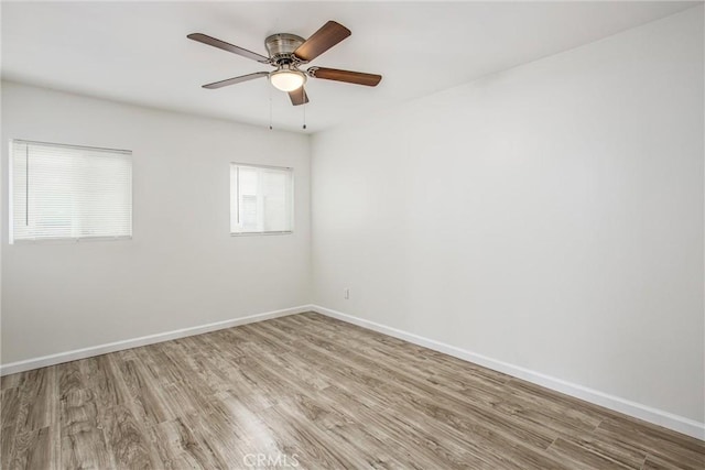 636 Harding Dr, Redlands, CA 92373 - unfurnished room with baseboards, a ceiling fan, and wood finished floors