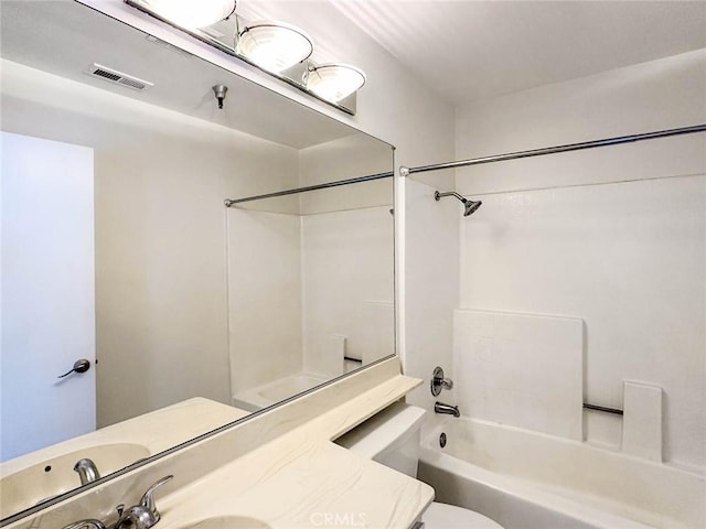 bathroom with vanity, bathtub / shower combination, toilet, and visible vents