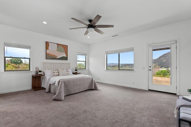 carpeted bedroom with visible vents, baseboards, access to outside, recessed lighting, and a ceiling fan