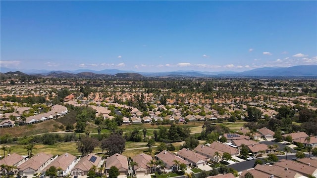 birds eye view of property with a residential view and a mountain view