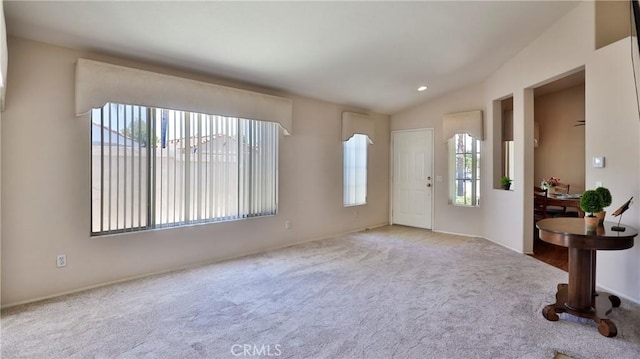 foyer featuring carpet floors, recessed lighting, and baseboards