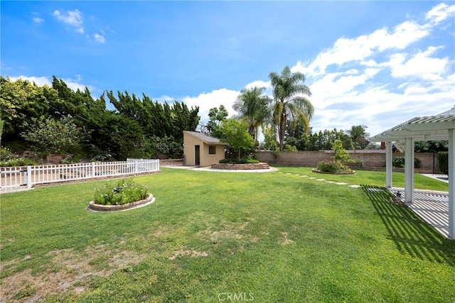 view of yard featuring a fenced backyard and a pergola