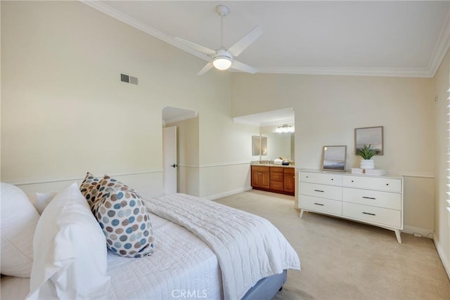 bedroom featuring crown molding, baseboards, visible vents, and light carpet