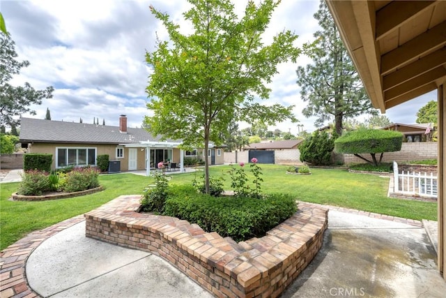 view of yard with a patio and fence