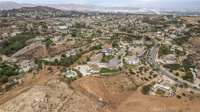 bird's eye view featuring a residential view and a mountain view