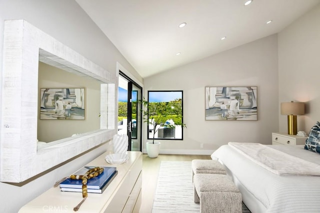 bedroom featuring recessed lighting, wood finished floors, and lofted ceiling