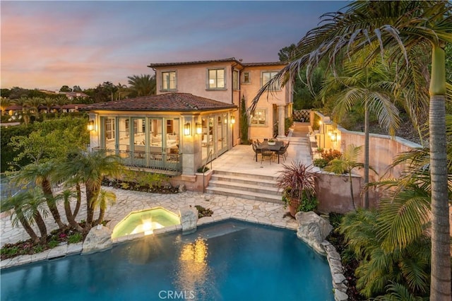 2008 Via Visalia, Palos Verdes Estates, CA 90274 - rear view of property featuring an outdoor pool, stucco siding, an in-ground hot tub, and a patio area