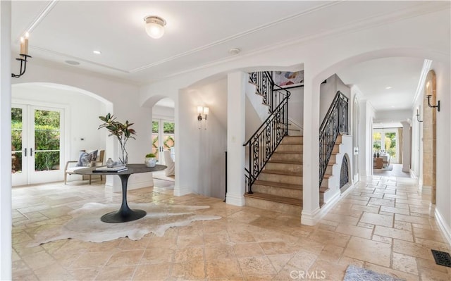 2008 Via Visalia, Palos Verdes Estates, CA 90274 - foyer entrance featuring arched walkways, stone tile floors, french doors, plenty of natural light, and recessed lighting