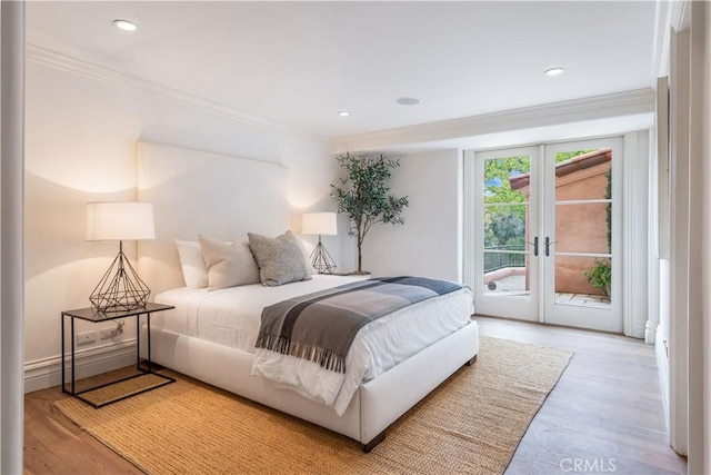 2008 Via Visalia, Palos Verdes Estates, CA 90274 - bedroom featuring access to outside, crown molding, wood finished floors, recessed lighting, and french doors