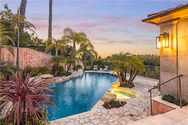 2008 Via Visalia, Palos Verdes Estates, CA 90274 - pool at dusk featuring a patio and a pool with connected hot tub