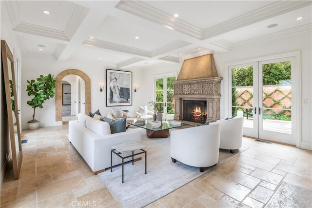 2008 Via Visalia, Palos Verdes Estates, CA 90274 - living area featuring stone tile floors, arched walkways, coffered ceiling, french doors, and beamed ceiling