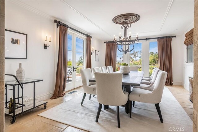 2008 Via Visalia, Palos Verdes Estates, CA 90274 - dining space with a chandelier, plenty of natural light, stone tile flooring, and ornamental molding