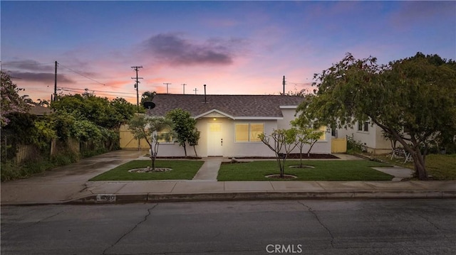 920 W Hollyvale St, Azusa, CA 91702 - view of front of property featuring concrete driveway, a lawn, roof with shingles, and stucco siding