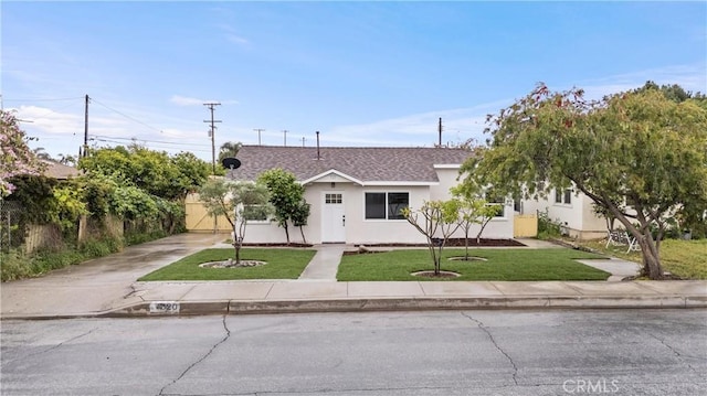 920 W Hollyvale St, Azusa, CA 91702 - view of front of home featuring driveway, a front lawn, stucco siding, and roof with shingles