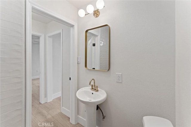 920 W Hollyvale St, Azusa, CA 91702 - half bathroom with wood finished floors and baseboards