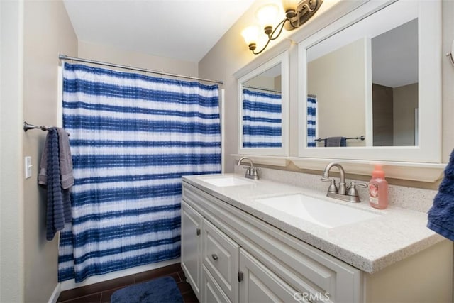 4 Mosaic, Aliso Viejo, CA 92656 - bathroom featuring double vanity, a sink, and tile patterned floors