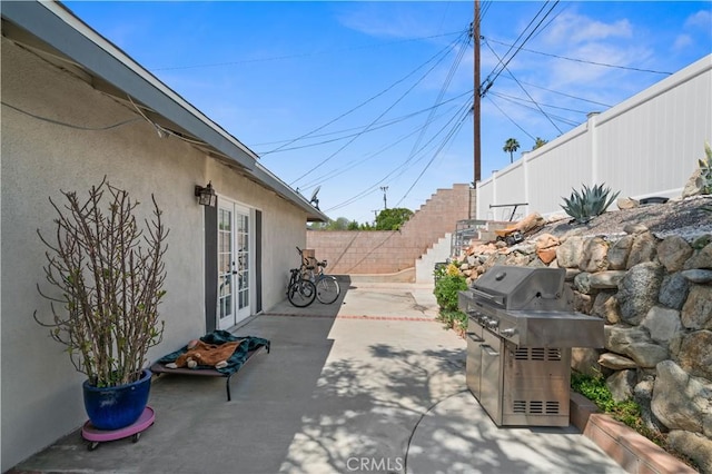 8784 Lurline St, Rancho Cucamonga, CA 91701 - view of patio / terrace featuring french doors, grilling area, and fence