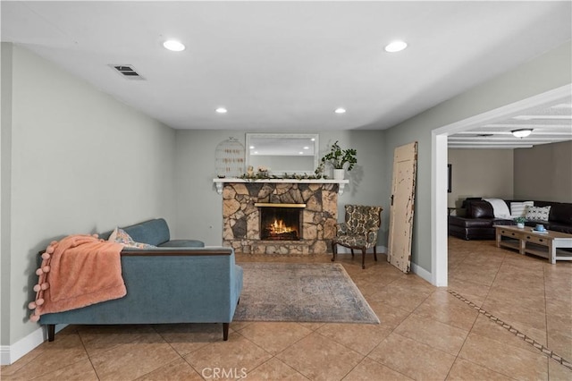 8784 Lurline St, Rancho Cucamonga, CA 91701 - tiled living room featuring a fireplace, recessed lighting, and baseboards