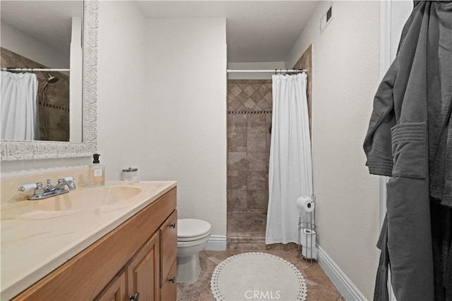 8784 Lurline St, Rancho Cucamonga, CA 91701 - full bath featuring tiled shower, vanity, toilet, and baseboards