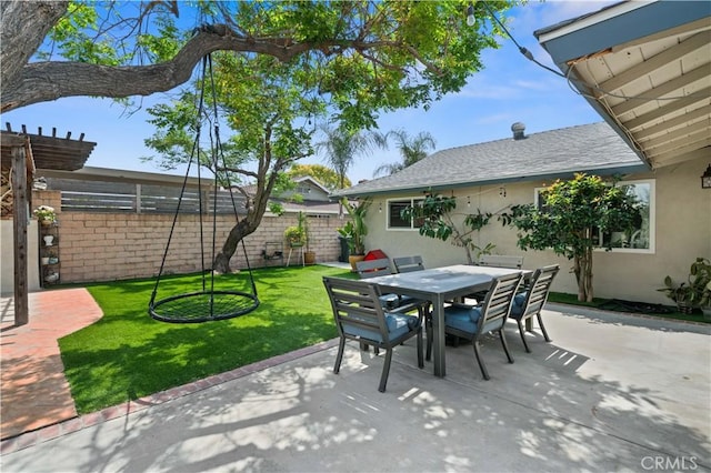 view of patio / terrace with outdoor dining area and a fenced backyard