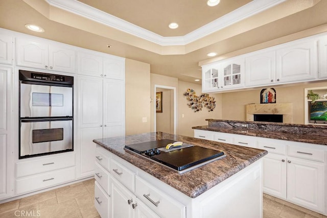 776 Avenida Salvador, San Clemente, CA 92672 - kitchen with recessed lighting, dark stone countertops, stainless steel double oven, and black electric stovetop