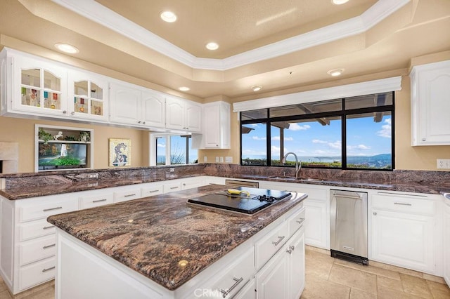 776 Avenida Salvador, San Clemente, CA 92672 - kitchen with a kitchen island, a sink, dark stone countertops, black electric stovetop, and recessed lighting