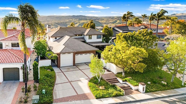 776 Avenida Salvador, San Clemente, CA 92672 - view of front of home with stucco siding, a tiled roof, a mountain view, driveway, and a residential view