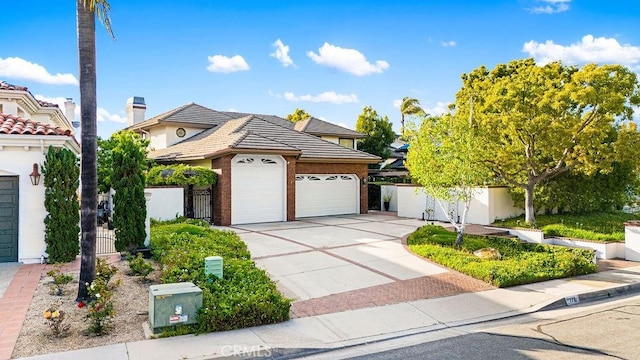 776 Avenida Salvador, San Clemente, CA 92672 - traditional home with fence, an attached garage, brick siding, concrete driveway, and a tiled roof