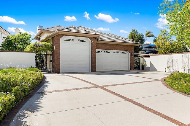 776 Avenida Salvador, San Clemente, CA 92672 - view of front of property with brick siding, a garage, fence, and driveway