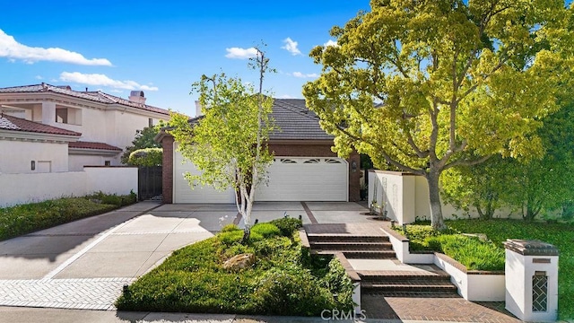 776 Avenida Salvador, San Clemente, CA 92672 - view of front of house with fence, driveway, a tile roof, and a garage