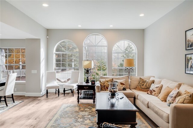 26122 Augusta Dr, Lake Arrowhead, CA 92352 - living room with plenty of natural light, recessed lighting, baseboards, and wood finished floors