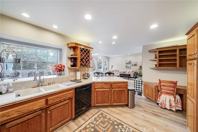 26122 Augusta Dr, Lake Arrowhead, CA 92352 - kitchen featuring open shelves, dishwasher, a sink, tile countertops, and light wood finished floors
