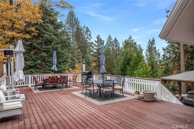 26122 Augusta Dr, Lake Arrowhead, CA 92352 - deck featuring outdoor dining area