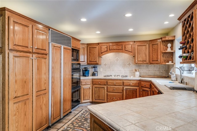 26122 Augusta Dr, Lake Arrowhead, CA 92352 - kitchen featuring recessed lighting, a sink, decorative backsplash, and black appliances
