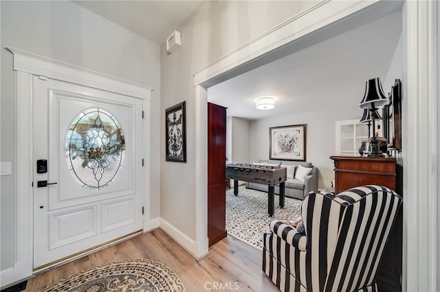 26122 Augusta Dr, Lake Arrowhead, CA 92352 - entrance foyer featuring light wood finished floors and baseboards