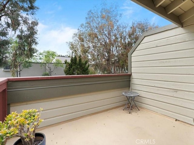 view of patio with a balcony