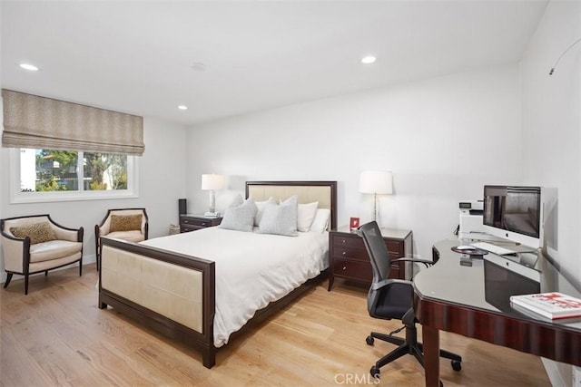bedroom featuring recessed lighting and light wood-style flooring