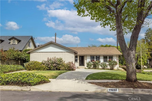 11652 Mclennan Ave, Granada Hills, CA 91344 - view of front of property with a front lawn