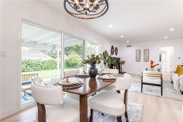 11652 Mclennan Ave, Granada Hills, CA 91344 - dining area with visible vents, baseboards, a chandelier, light wood-style floors, and recessed lighting