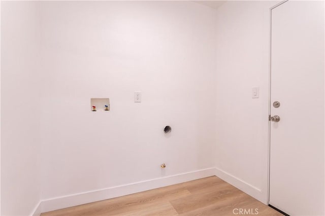 11652 Mclennan Ave, Granada Hills, CA 91344 - laundry room featuring laundry area, hookup for a washing machine, baseboards, and light wood-type flooring